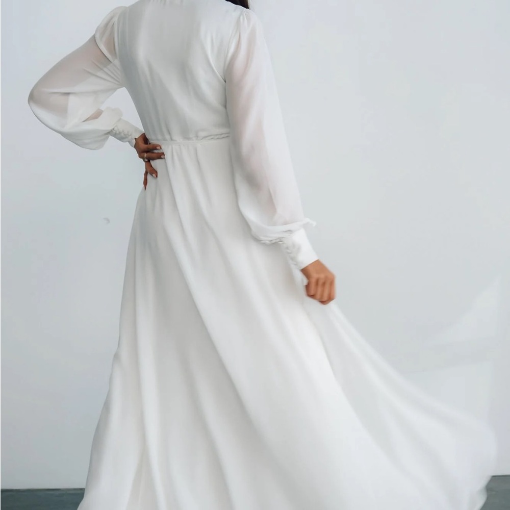 NWT, Baltic Born Kelsey wrap dress, color is off white